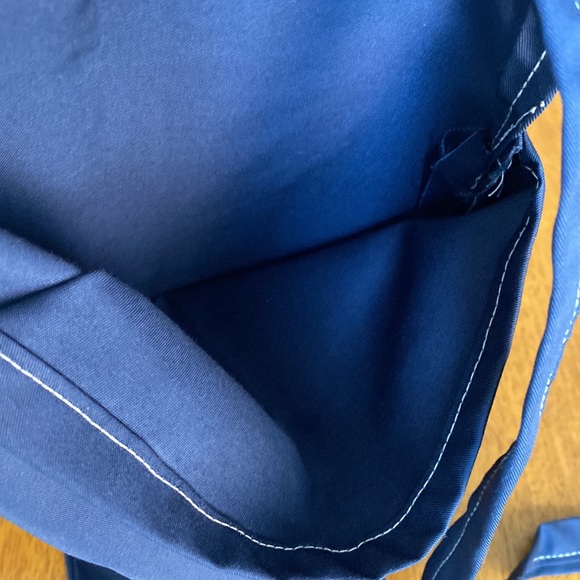 Apron with 2 large pockets. 17” length of apron. Tie around waist. - Picture 6 of 7